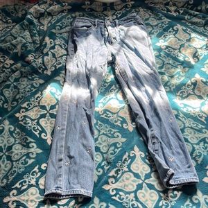 Jeans with white and yellow daisies from PacSun